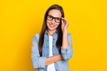 Photo of young prettty woman good mood eyewear career agent banker isolated over yellow color background