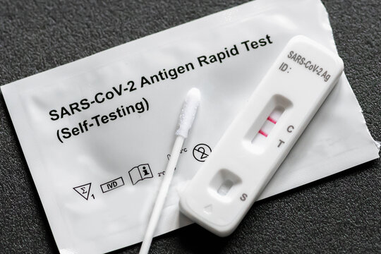 Positive Covid-19 antigen test kit for self testing, one step coronavirus antigen rapid test, saliva swab, 1 test box, close up
