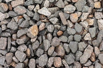 Photo of a large number of stones in different shades of gray. Abstract nature concept