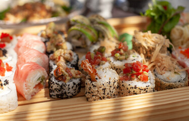 Sushi set on a wooden serving close-up