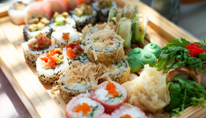 Sushi set on a wooden serving close-up
