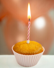 a holiday background of champagne, balloons, and a cake