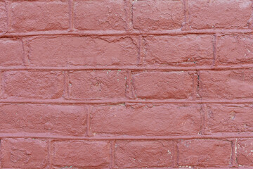 The weathered texture of old dirty red brick wall background. Building. Copy space