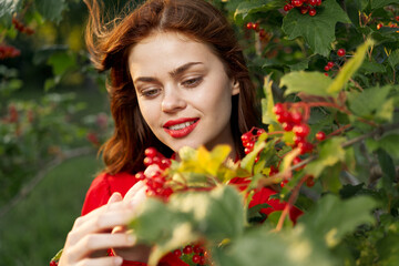 Beautiful woman fresh air summer berries nature