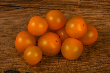 Fresh yellow cherry tomato heap