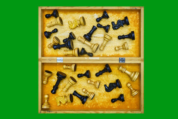 An inverted old chessboard for collecting retro pieces after the game, isolated on a green chromakey