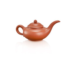Ceramic teapot handmade isolated on a grey background
