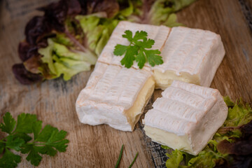 Pont l'Eveque, French Cheese from Normandy produced from Cow's Milk on turntable . High quality photo