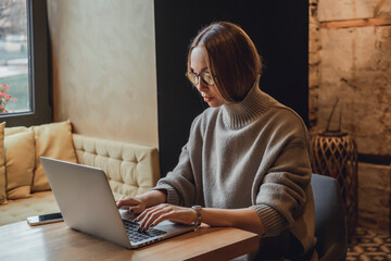 Pretty Young Beauty Woman Using Laptop in cafe, outdoor portrait business woman, hipster style, internet, smartphone, office, Bali Indonesia, holding, mac OS, manager, freelancer 

