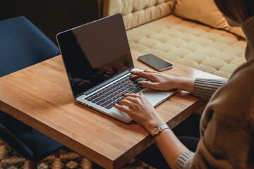 Pretty Young Beauty Woman Using Laptop in cafe, outdoor portrait business woman, hipster style,...
