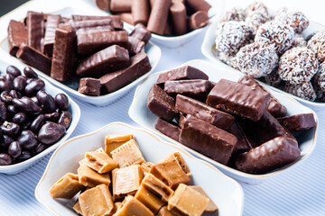 Assortment of delicious chocolate candies background. Chocolate candy isolated 
