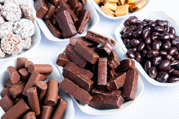 Assortment of delicious chocolate candies background. Chocolate candy isolated 