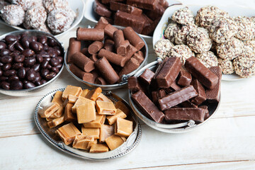Assortment of delicious chocolate candies background. Chocolate candy isolated 