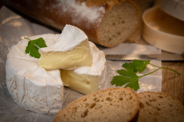 Camembert cheese on a wooden background, High quality photo