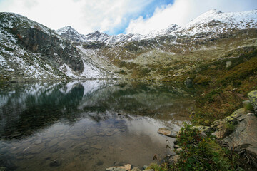 Naklejka na ściany i meble Mountain lake in the Caucasus Mountains, Arkhyz, Russia.