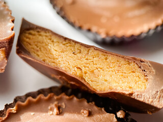 Close up macro shot of Peanut butter filled candy with chocolate frosting - Powered by Adobe