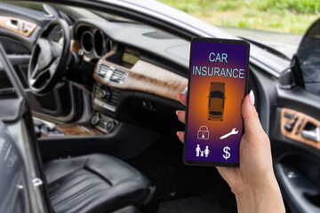woman hand holding smartphone to use car insurance application online after his broken car....