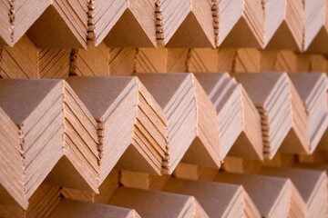 Stackes of cardboard angular edge protectors for protection goods while transportation on pallet....