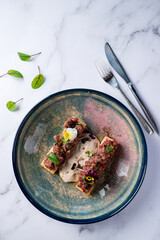 Crostini with Beef Tartare and Rocket, bruschetta with beef tartare