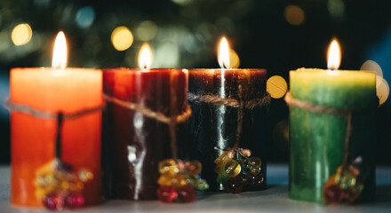 burning Advent candles Christmas background