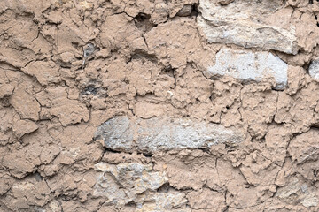 Clay wall. Clay background. Clay texture with stone