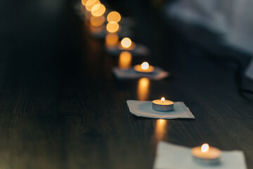 burning candles on the floor