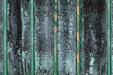 Green textured background with black cracks