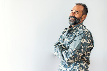 Portrait of a handsome man in his United States military uniform; copy space. Happy Military Man....