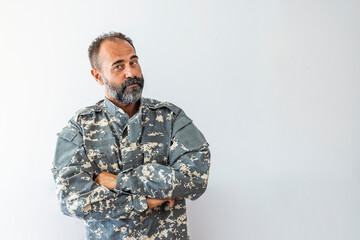 Portrait of a handsome man in his United States military uniform; copy space. Happy Military Man....