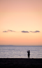 Fototapeta premium silhouette of a person on a sunset