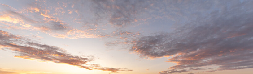 Glowing sky at dusk on a fall evening. Banner, panoramic.