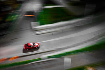 Long shutter photo of car in city track. Motion blur concept.