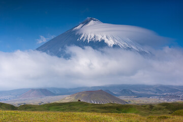 The cone of the Klyuchevskaya Sopka, the stratovolcano. It is the highest mountain on the Kamchatka Peninsula of Russia and the highest active volcano of Eurasia