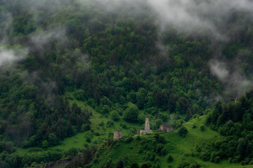 Lower Ozdik medieval tower complex has the 4 level combat tower and the residential buildings, a few crypts are located on the mountain range nearby. Ingush combat towers were designed for defence.