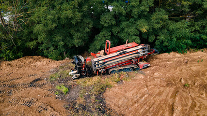 Aerial view of Drilling machine work process. Horizontal directional drilling technology....