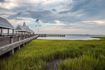 White pier and sea grass at Charleston bay