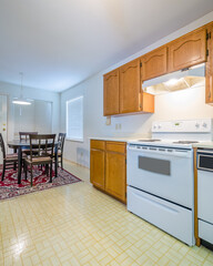 An empty kitchen in a house.