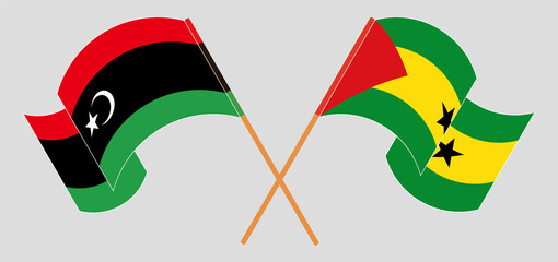 Crossed and waving flags of Libya and Sao Tome and Principe