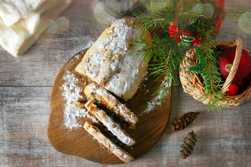 Christmas cake. Fruitcake. Natural wooden background. Top view.