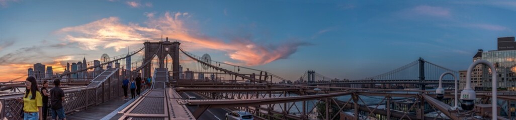 Night coming over famous Brooklyn Bridge, New York City