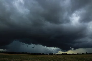 Fotobehang massive distant storm © Dylan
