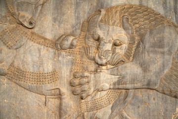 Intricate stone carvings in Persepolis, Iran showcasing the detailed craftsmanship and artistic...
