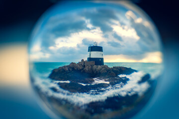 costal tower lighthouse in a sphere