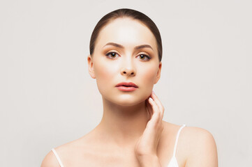 Beautiful woman with clear skin. SPA concept. Natural beauty. Stylish model