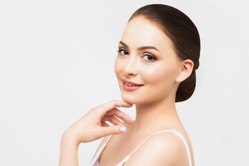 Beautiful woman with clear skin. SPA concept. Natural beauty. Stylish model