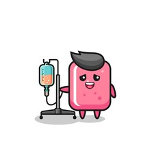 cute bubble gum character standing with infusion pole