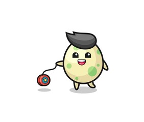 cartoon of cute spotted egg playing a yoyo
