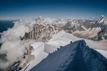 Photo sur Plexiglas Mont Blanc Alpine mountain landscape of Mont Blanc Masiff, Chamonix, France. Alpine peaks, Aiguille du Midi and other famous alpine mountains. Alpinism, climbing, glaciers and snow.