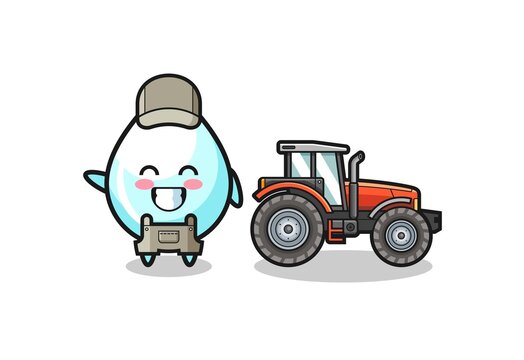 the milk drop farmer mascot standing beside a tractor