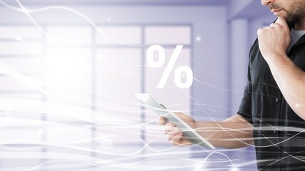 Interest rate, financial, ranking and mortgage rates concept. Hand touch tablet with digital...